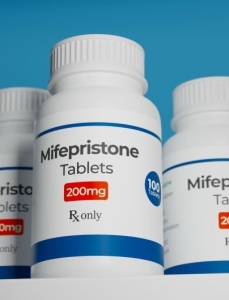 Mifepristone tablets in bottle. RU-486 Medical abortion pills. Used in combination with misoprostol.
