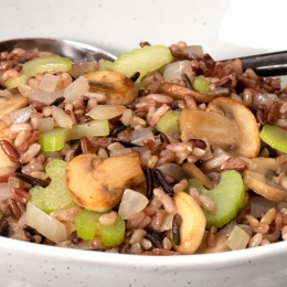 wild rice, mushrooms, and celery in a bowl