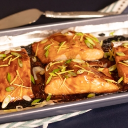4 salmon filets with glaze drizzled over 
