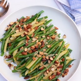 Plate filled with green beans and chopped almonds