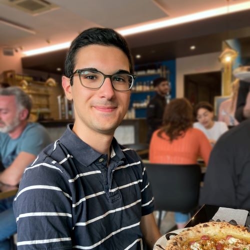 Ari Navetta and a pizza