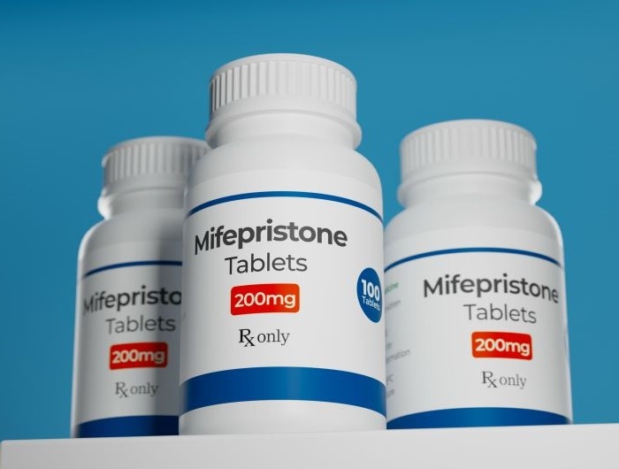 Mifepristone tablets in bottle. RU-486 Medical abortion pills. Used in combination with misoprostol.