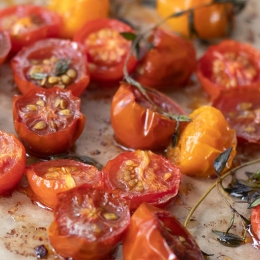 roasted tomatoes with sprigs of thyme