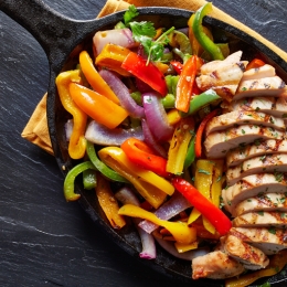 fajita chicken and peppers in a skillet
