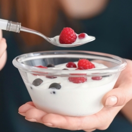 a bowl of yogurt with berries