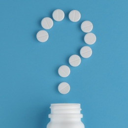 pills in a question mark shape