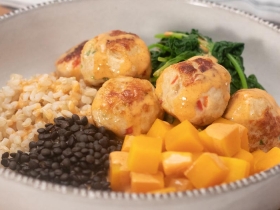chicken meatballs with an assortment of sides