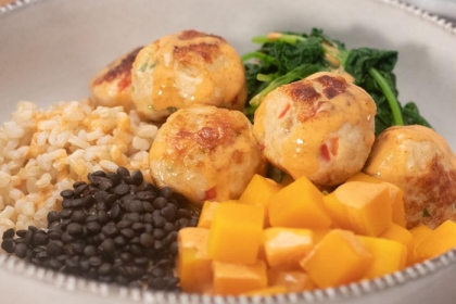 chicken meatballs with an assortment of sides