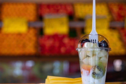 A pre-packaged fruit and yogurt cup which is a healthier alternative to sodas and candies