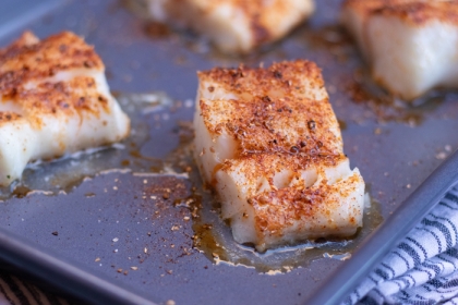 roasted white fish on a sheet pan