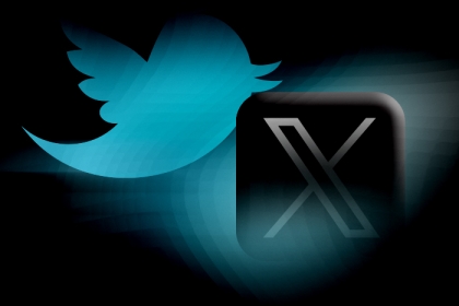 Twitter/X logos fading into a black background