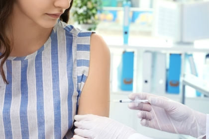 young woman receiving vaccine