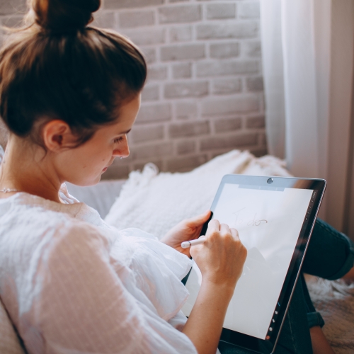 Woman using smart tablet