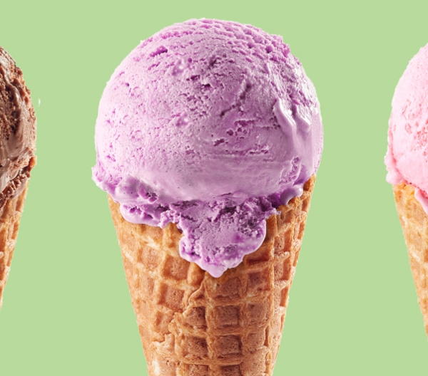 3 ice cream cones with one chocolate scoop, one purple scoop, one pink scoop on a green background.