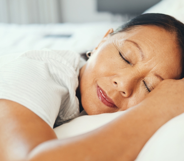 woman's head on a pillow, sleeping