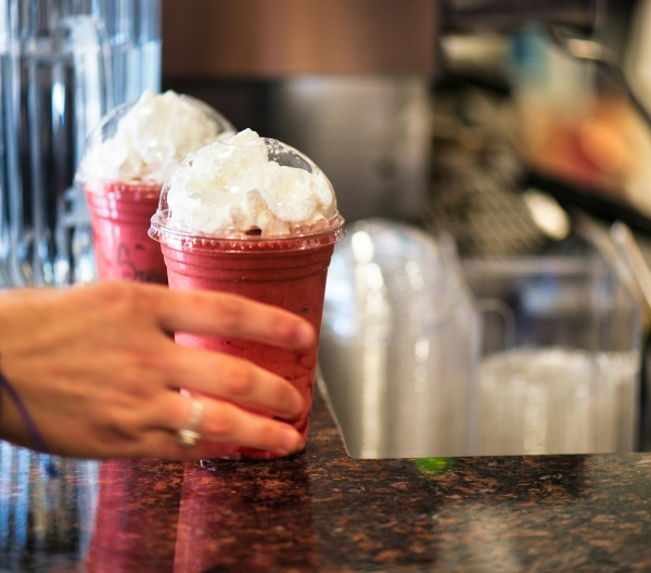 Berry frappe drink with whipped cream
