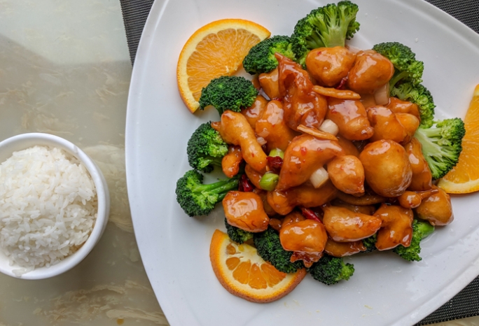sweet and sour chicken with broccoli and white rice