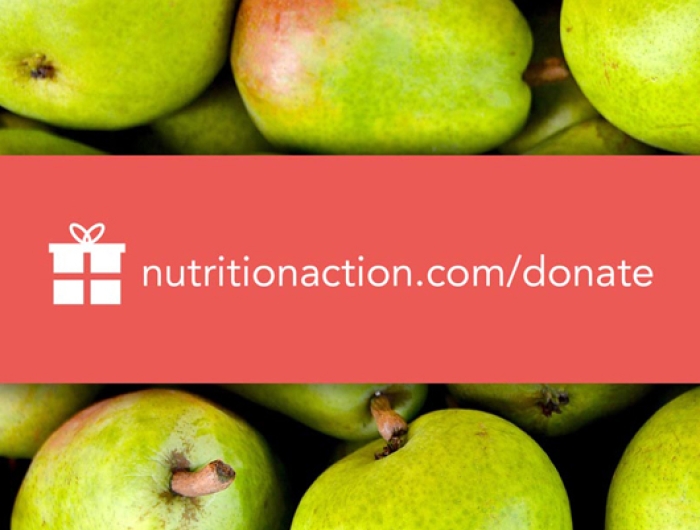 nutritionaction.com/donate on a background of pears