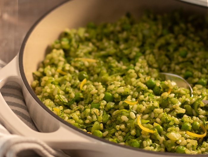 a pot of green risotto