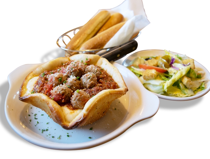 olive garden's meatball pizza bowl with breadsticks and side salad