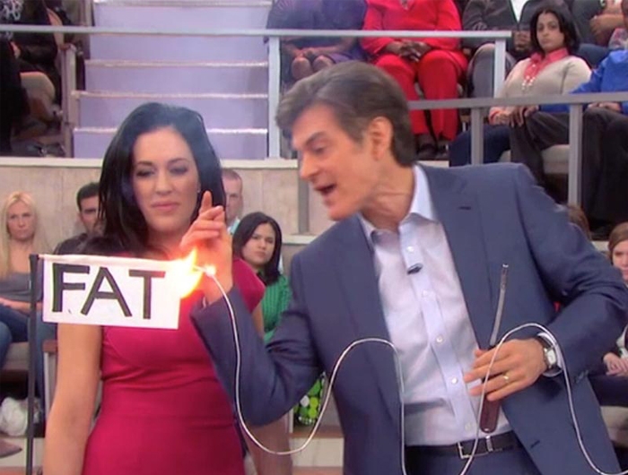 screenshot of Dr. Oz lighting the word "fat" on fire