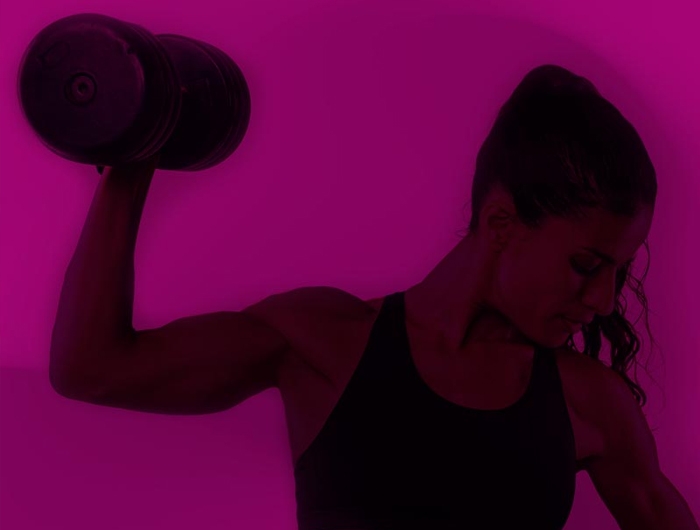 strong woman holding dumbbell 