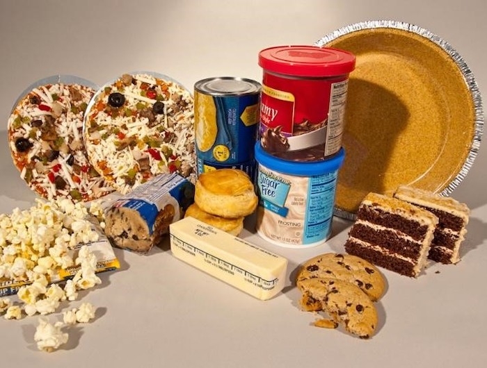 Processed foods containing trans fats (popcorn, pizza, icing, cookies, cake, pie crust, butter, biscuits)