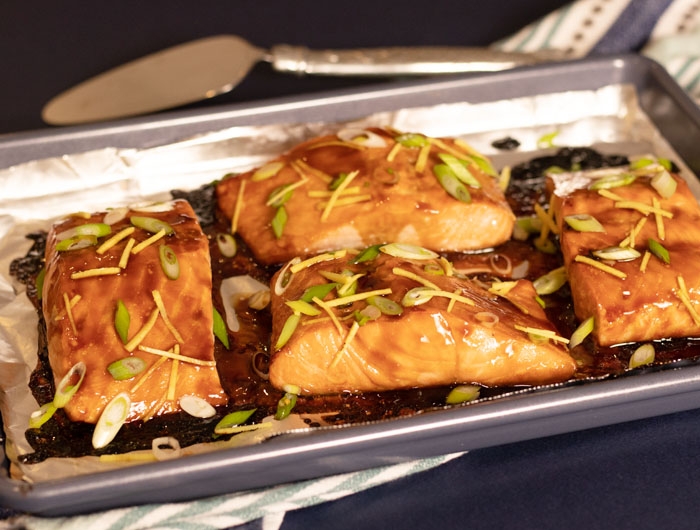 4 salmon filets with glaze drizzled over 