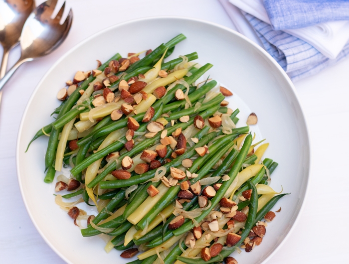 Plate filled with green beans and chopped almonds