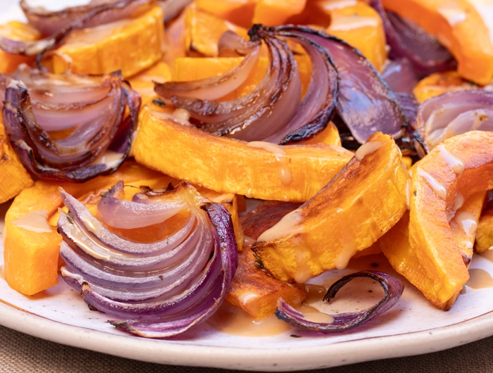 plate of  chopped onions and sweet potatoes 