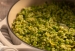 a pot of green risotto