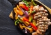 fajita chicken and peppers in a skillet