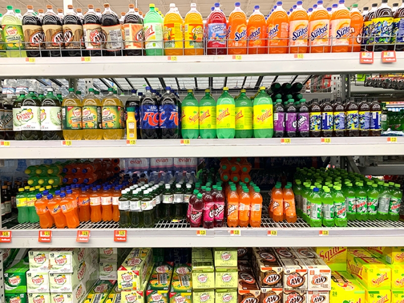Sodas on shelves in a grocery store