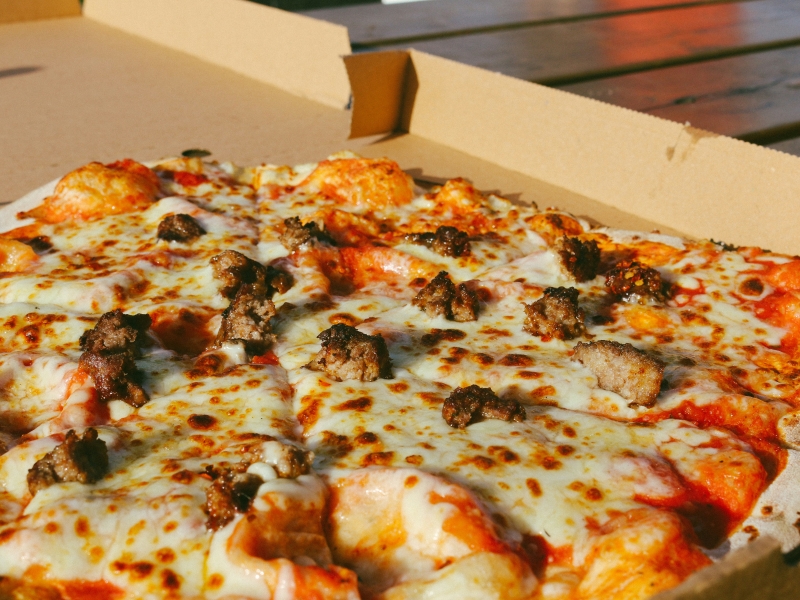 Close-up shot of pizza in a box