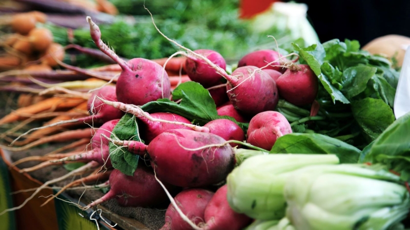 April produce - radishes for sale at a farmers market
