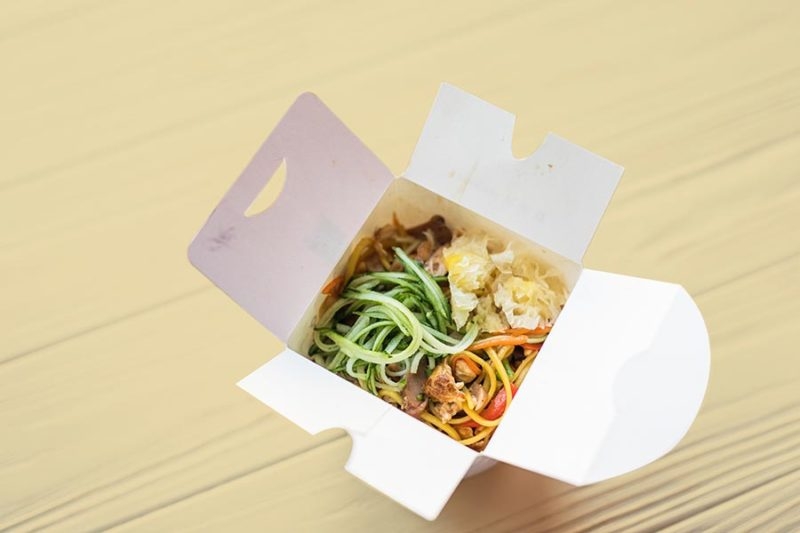 open take out box of noodles and vegetables