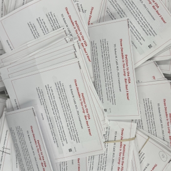 A pile of paper mailers from supporters of CSPI's petition to ban Red 3, addressed to FDA Commissioner Robert Califf