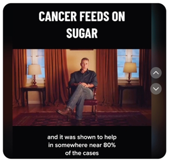 screenshot of an add that says "cancer feeds on sugar" with a man sitting in a chair